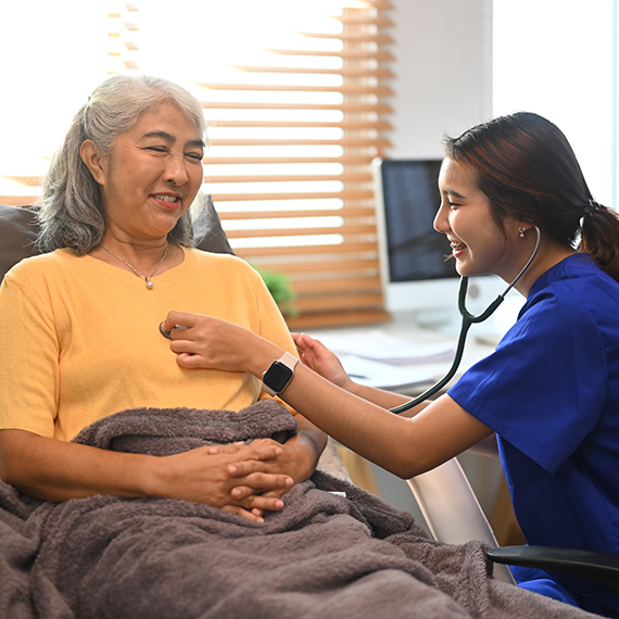 Compassionate hospice caregiver supporting family members